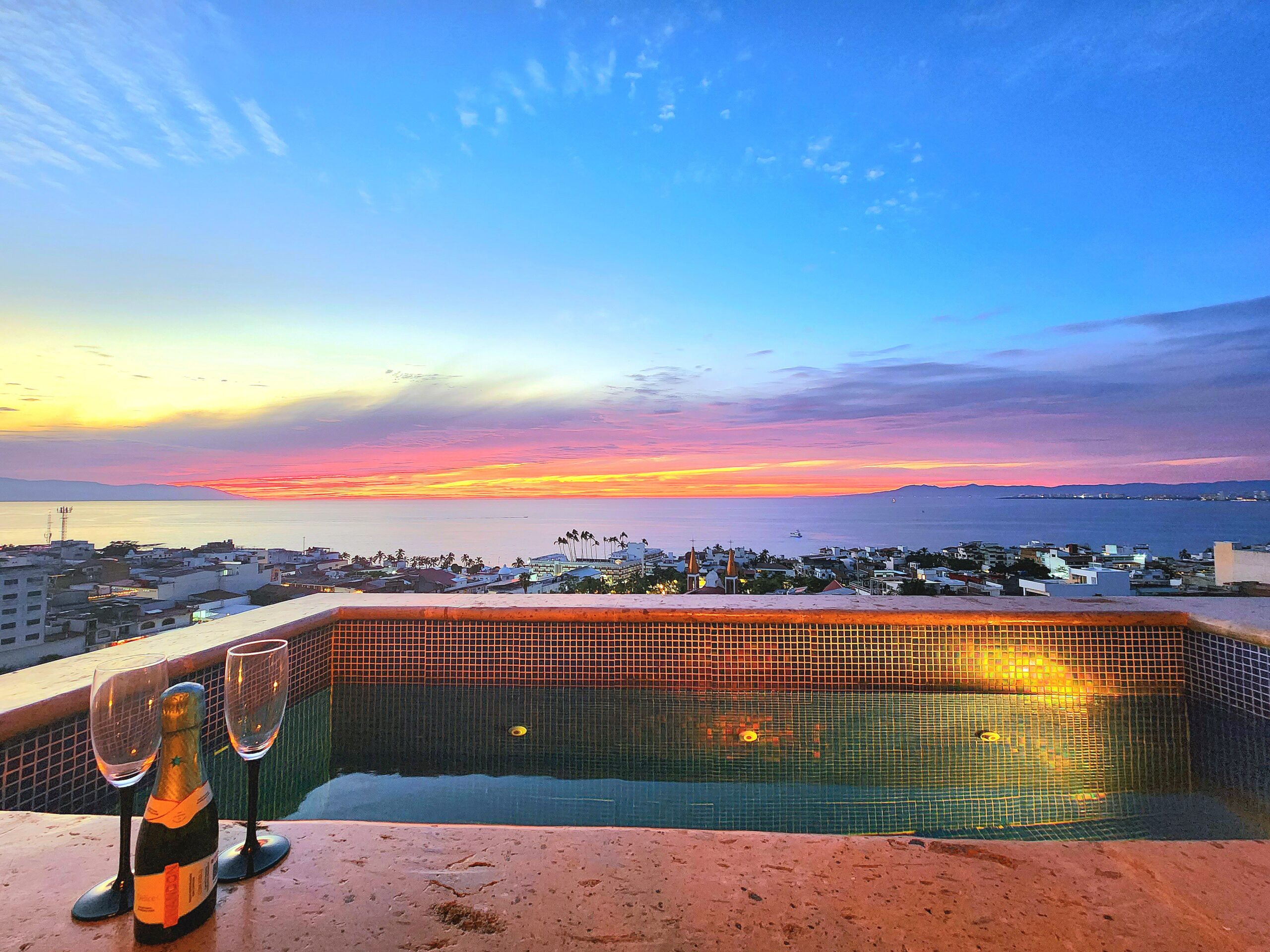 Serene private pool at sunset, ideal for evening relaxation